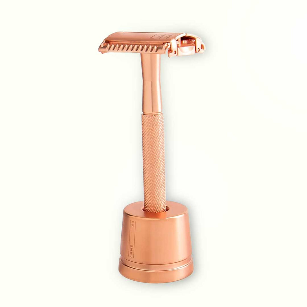 rose gold safety razor in stand