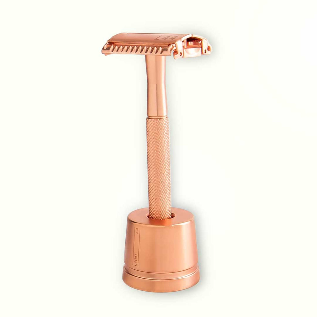 rose gold safety razor in shaving stand