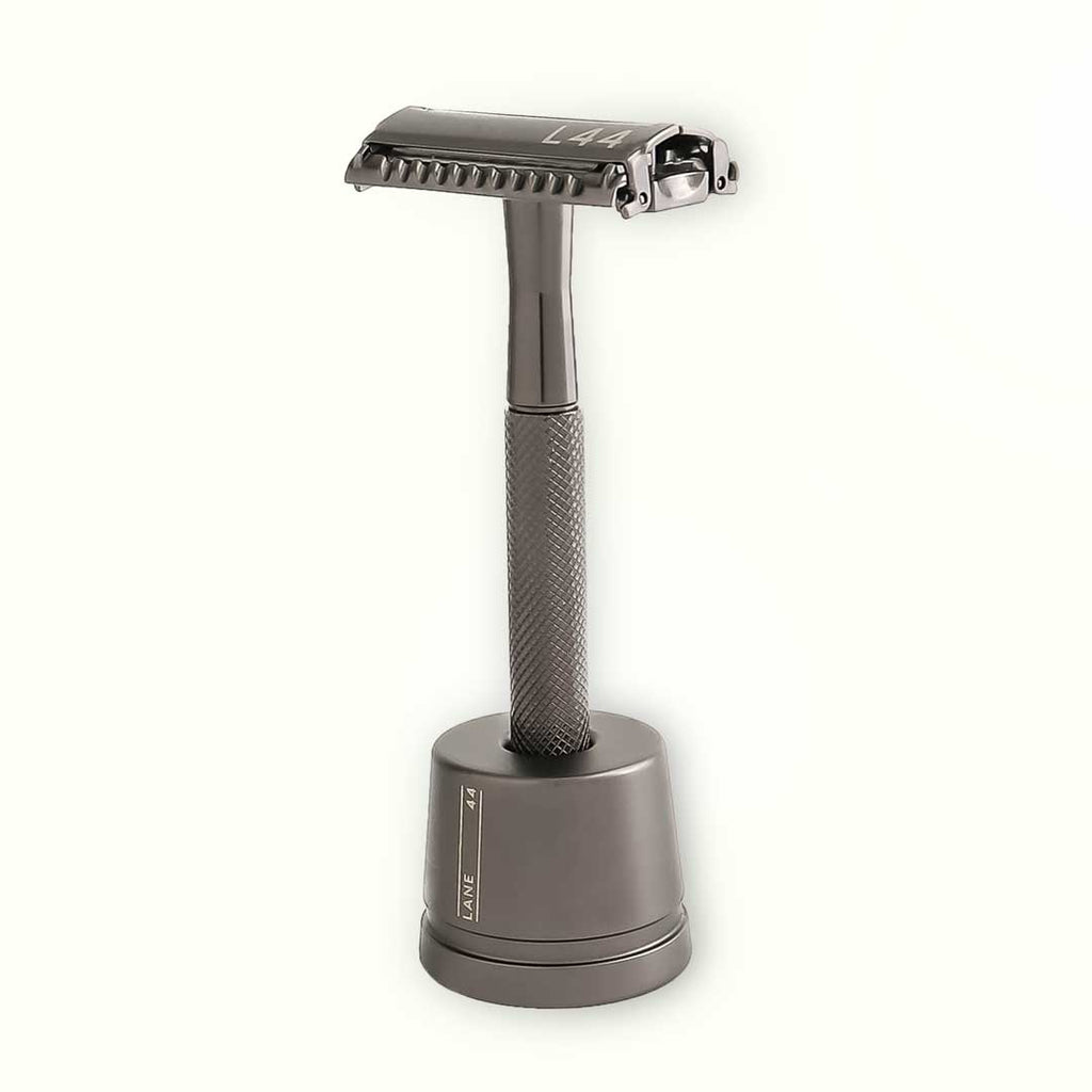black safety razor in shaving stand