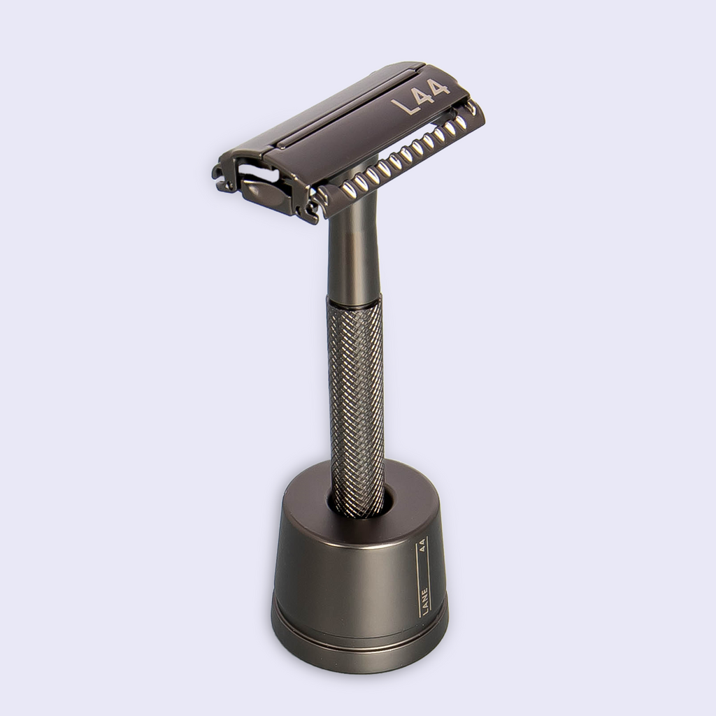 black safety razor in stand